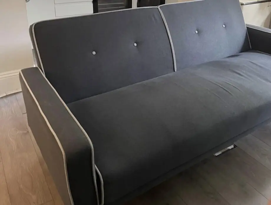 Grey sofa with wooden legs