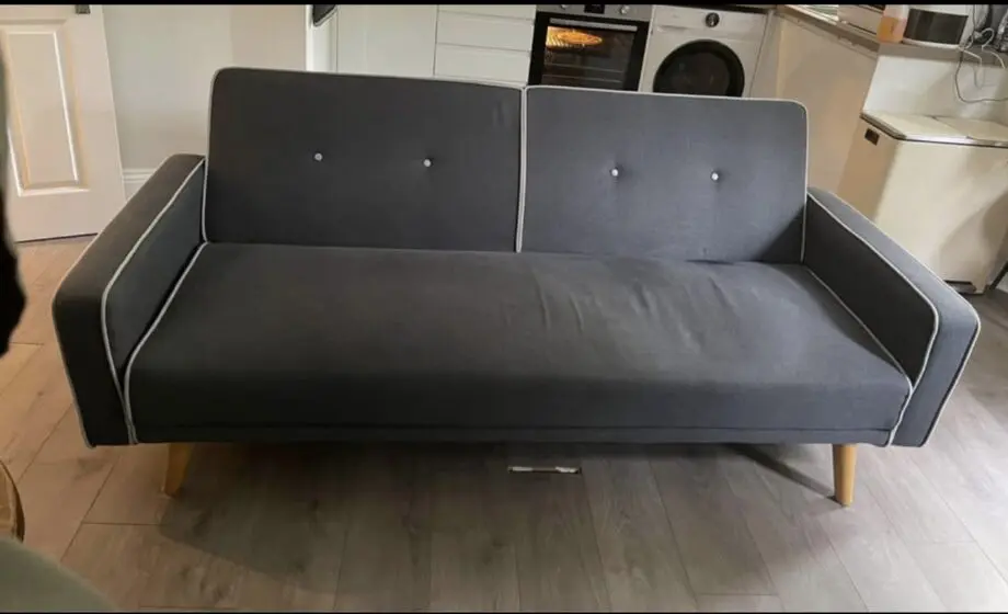 Grey sofa with wooden legs