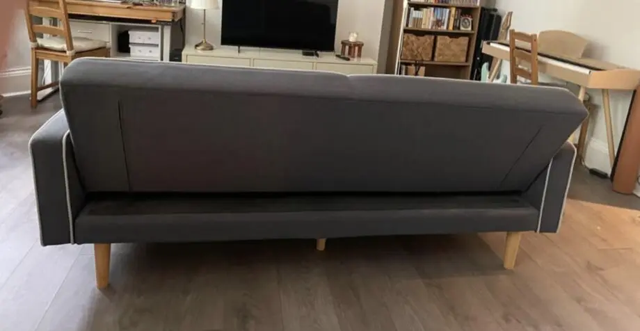 Grey sofa with wooden legs