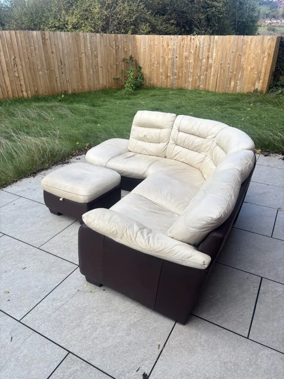 CREAM/BROWN LEATHER CORNER SOFA AND FOOTSTOOL