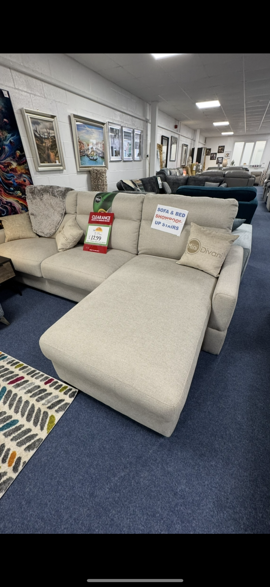 beige L shaped sofa