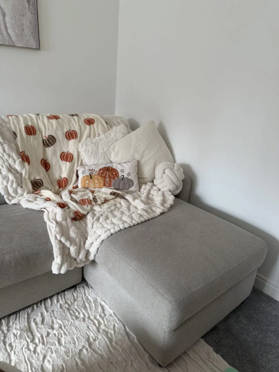 beige L shaped sofa