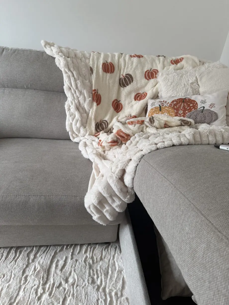 beige L shaped sofa