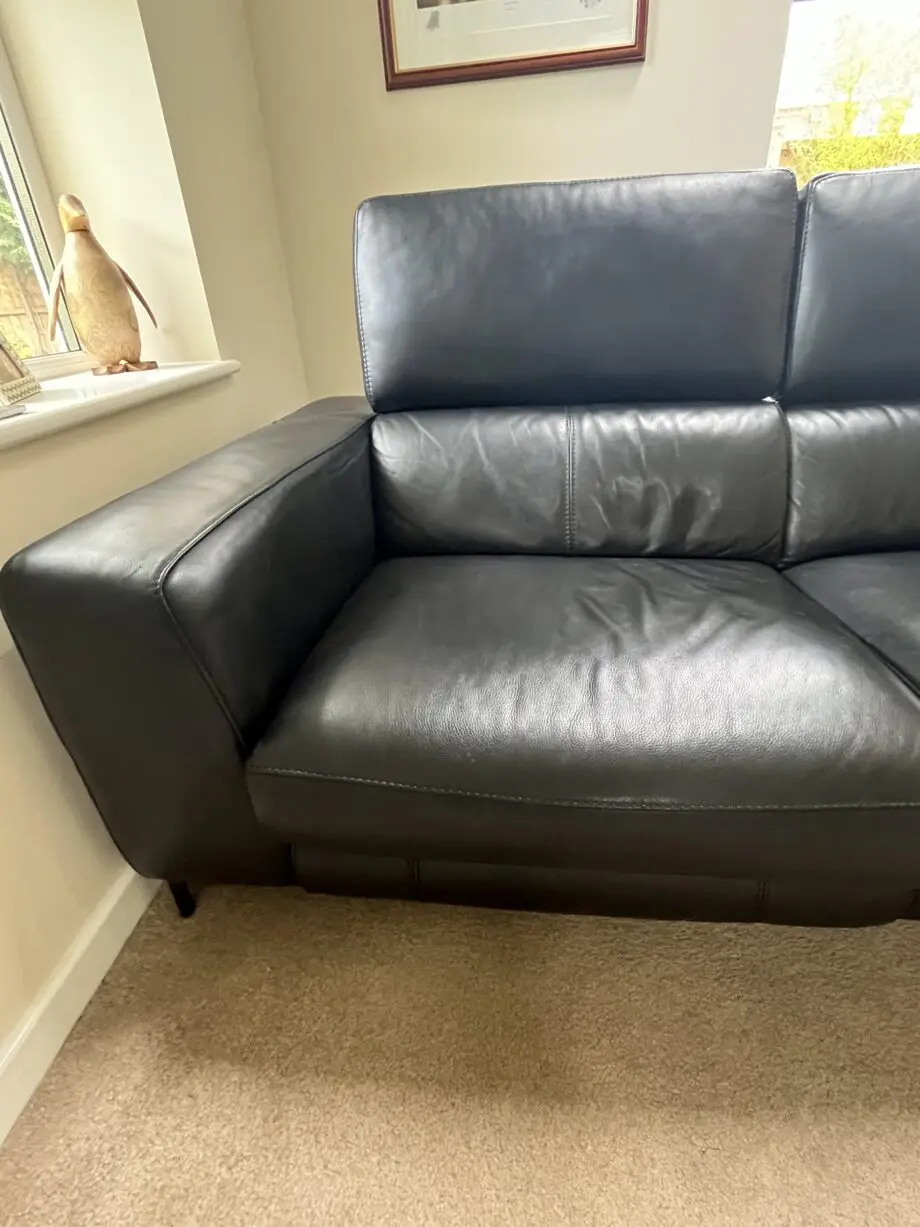 Large reclining 3 seater black leather sofa
