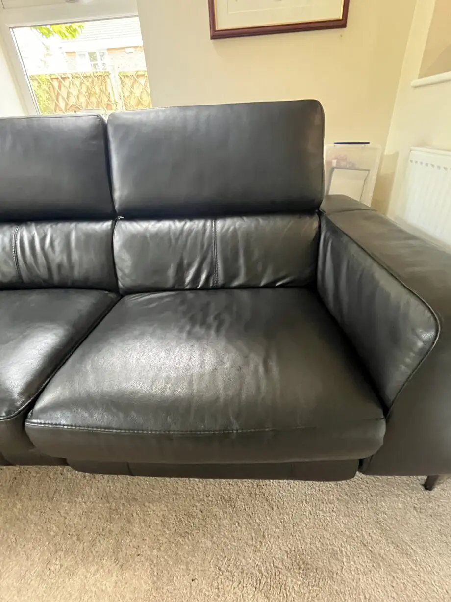 Large reclining 3 seater black leather sofa