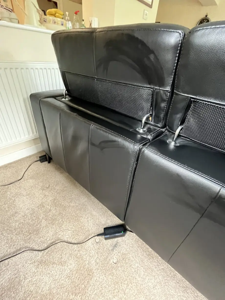 Large reclining 3 seater black leather sofa