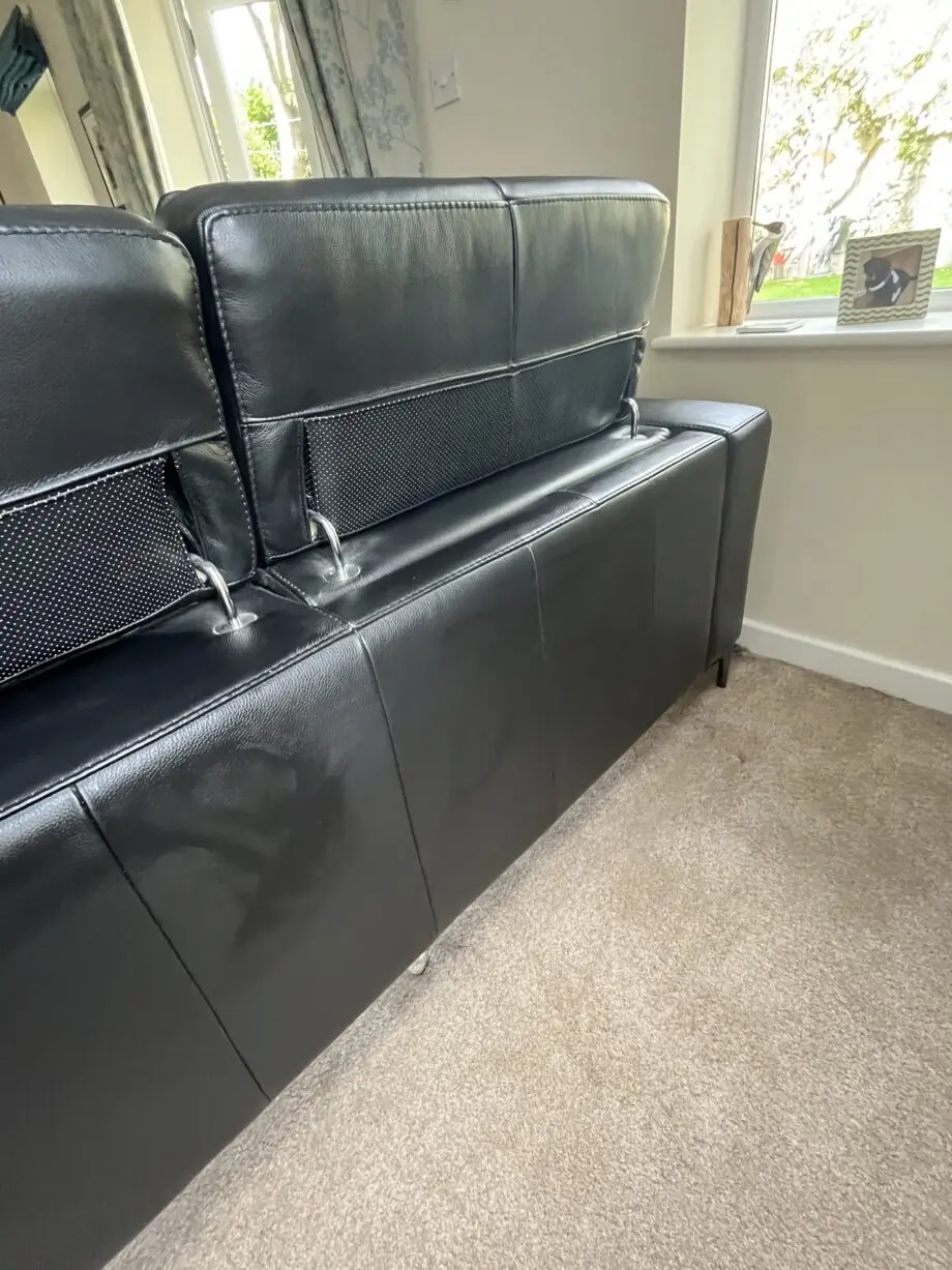 Large reclining 3 seater black leather sofa