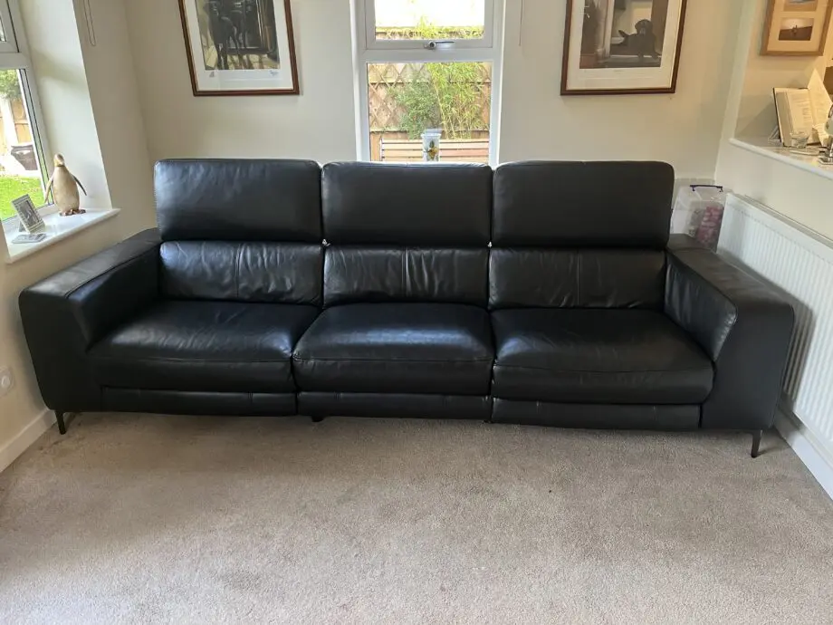 Large reclining 3 seater black leather sofa