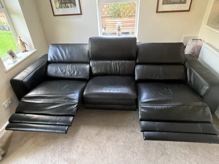 Large reclining 3 seater black leather sofa