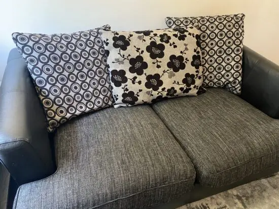 DFS grey and black sofas