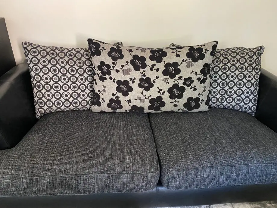 DFS grey and black sofas