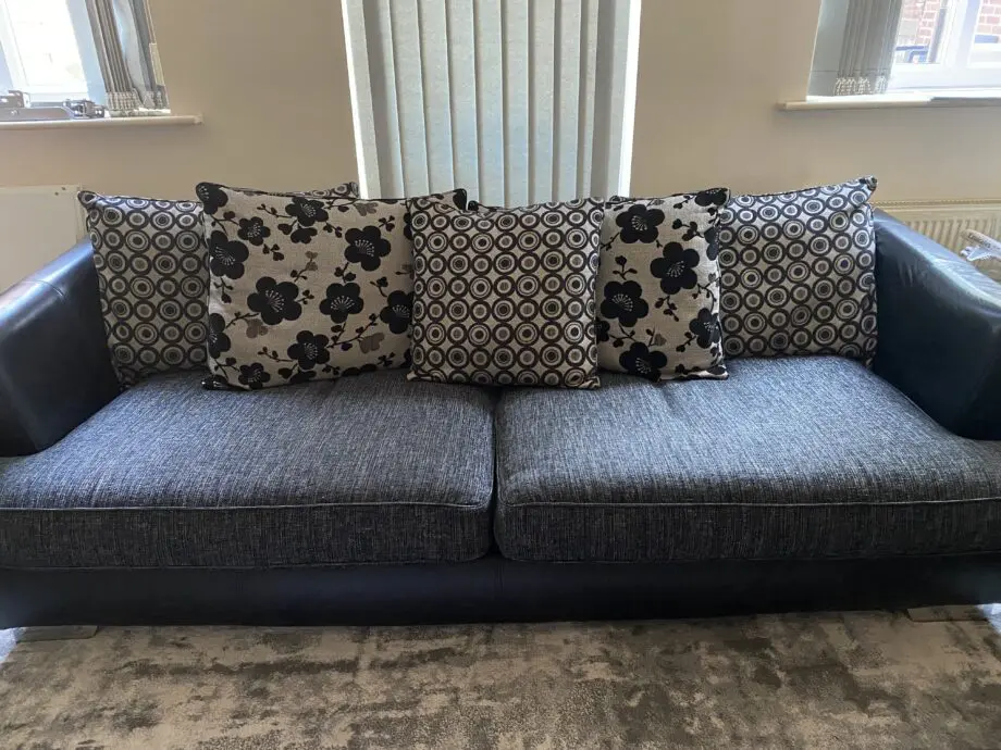 DFS grey and black sofas