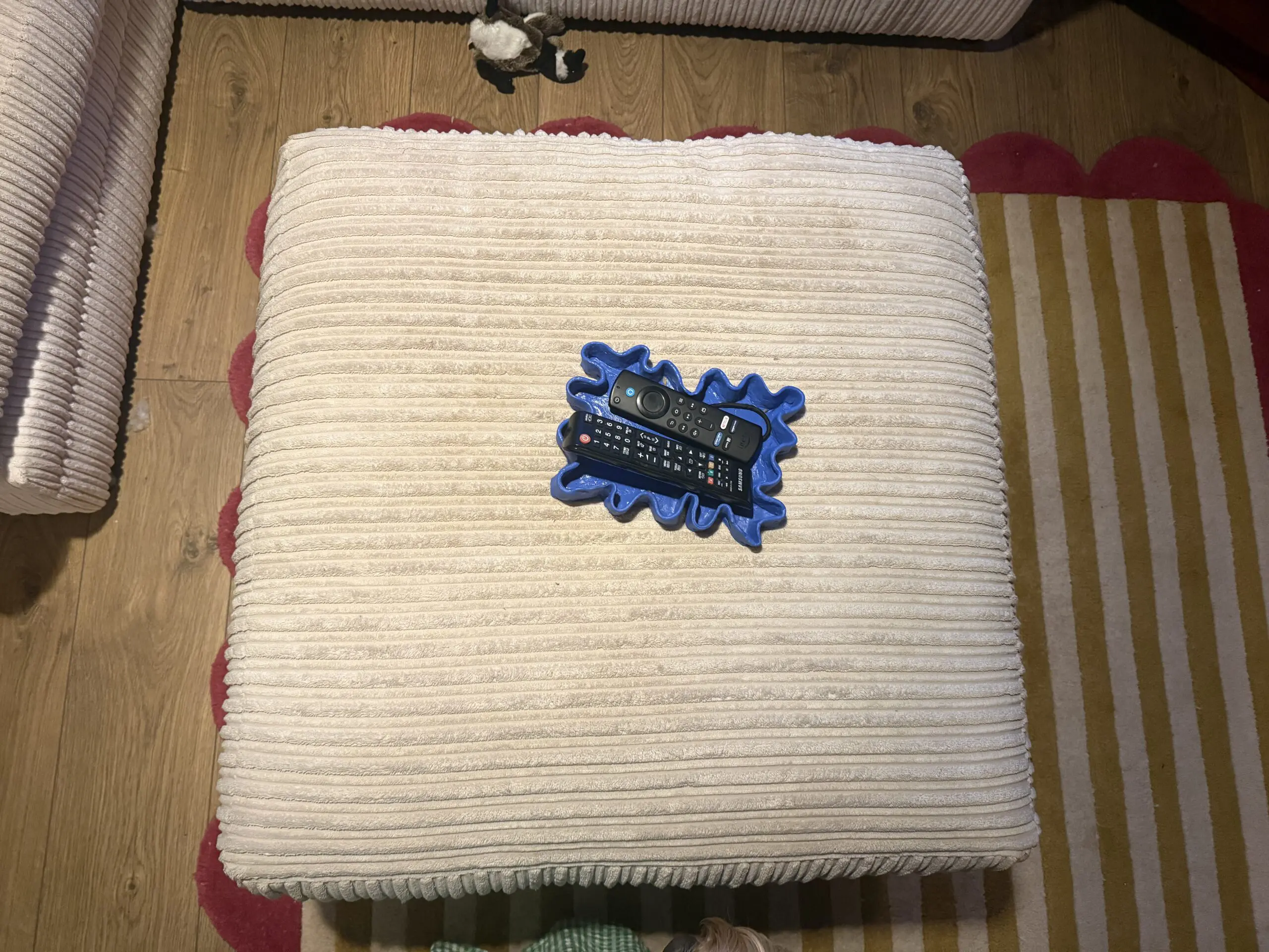 Cream corner sofa with matching footstool