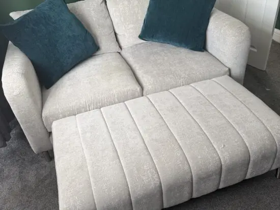 2 seater sofa and pouffe