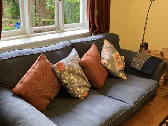 Faded navy blue sofa