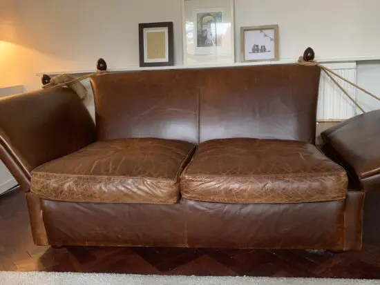 Laura Ashley brown leather 2 seater sofa daybed