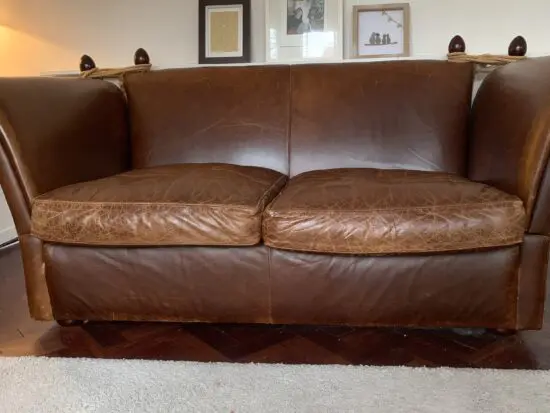Laura Ashley brown leather 2 seater sofa daybed