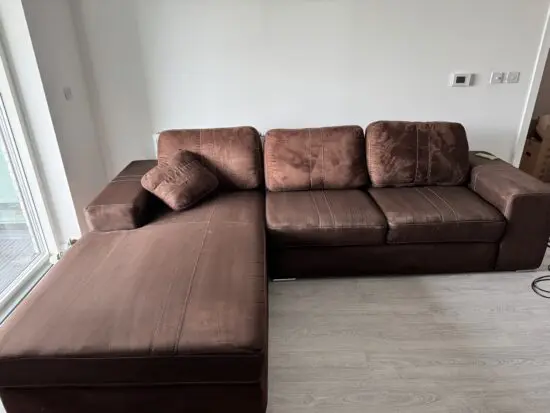 Brown L shape sofa