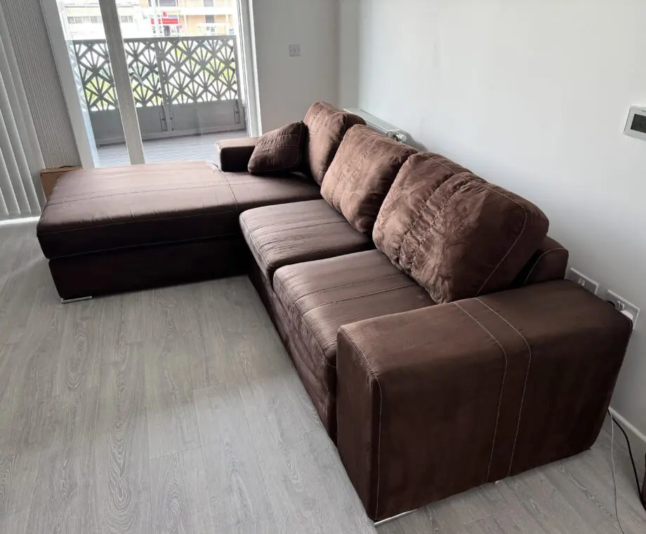 Brown L shape sofa