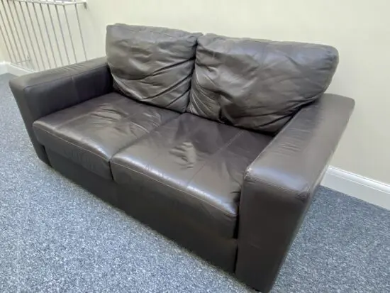 Leather brown 2 seater sofa bed
