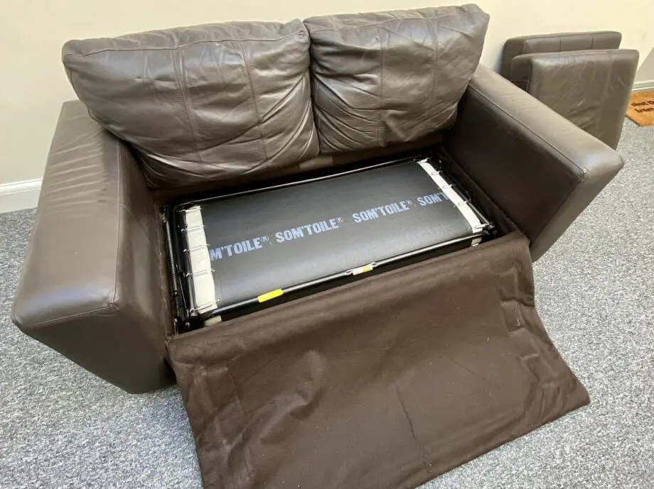 Leather brown 2 seater sofa bed