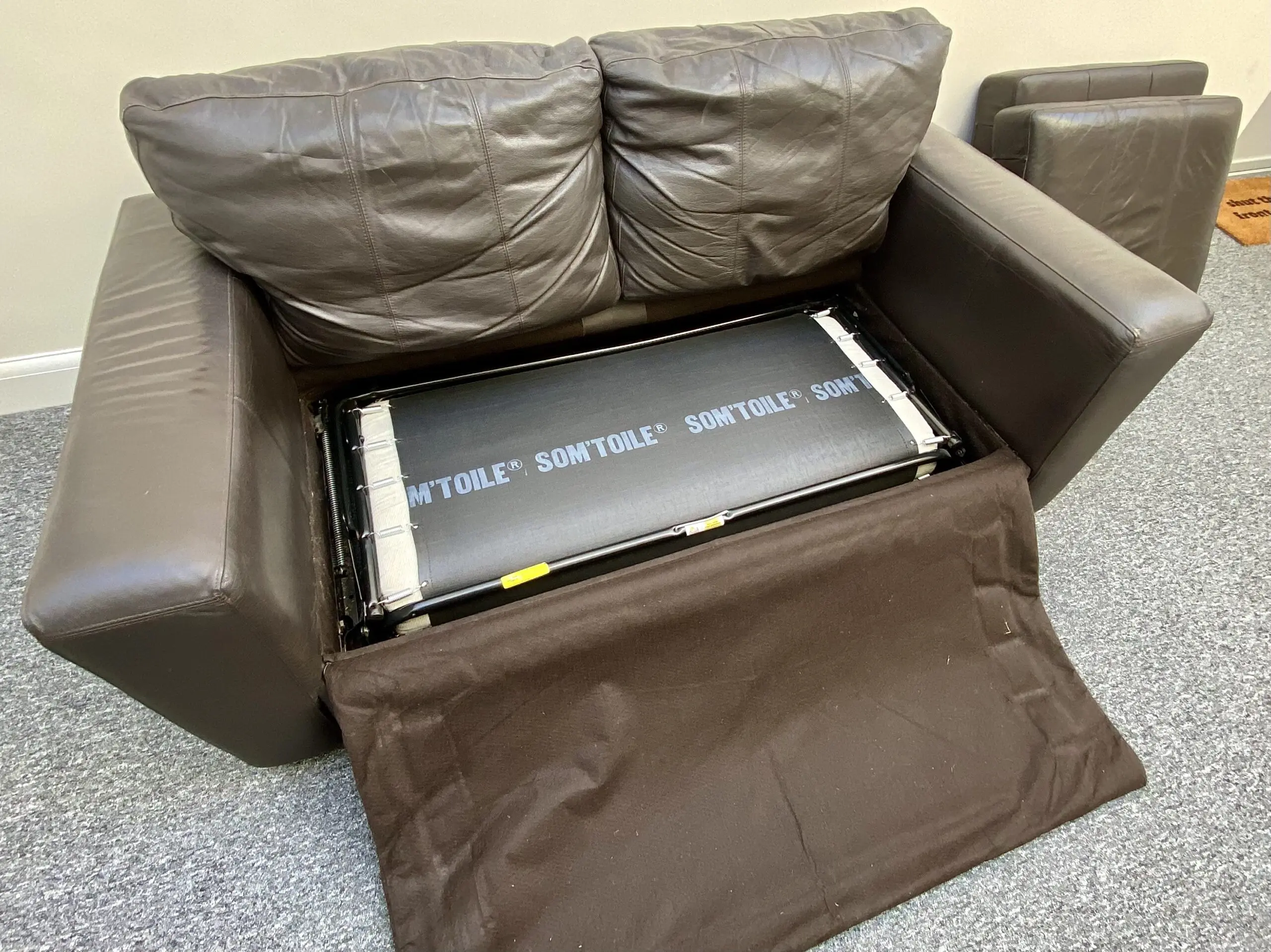 Leather brown 2 seater sofa bed
