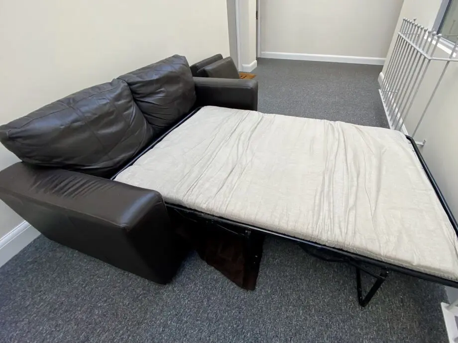 Leather brown 2 seater sofa bed