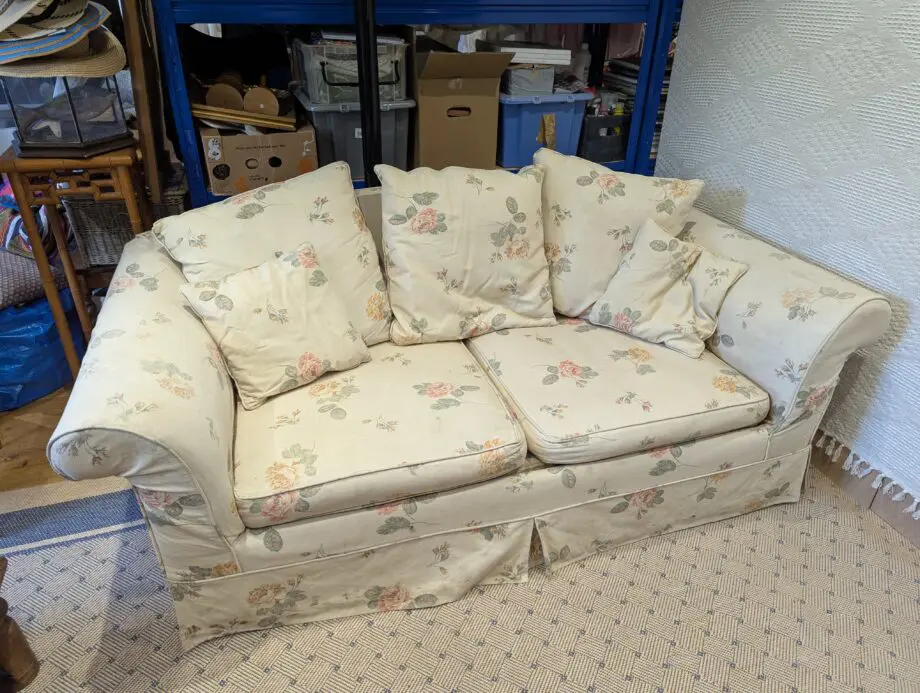 Cream floral sofa bed - good condition - country cottage style