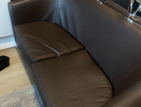 Dark brown two seater sofa