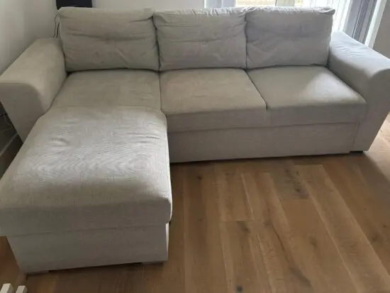 Extendable L-shaped sofa