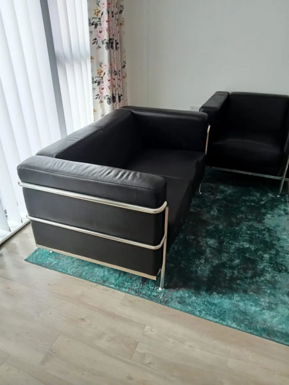 2 seater black leather sofa