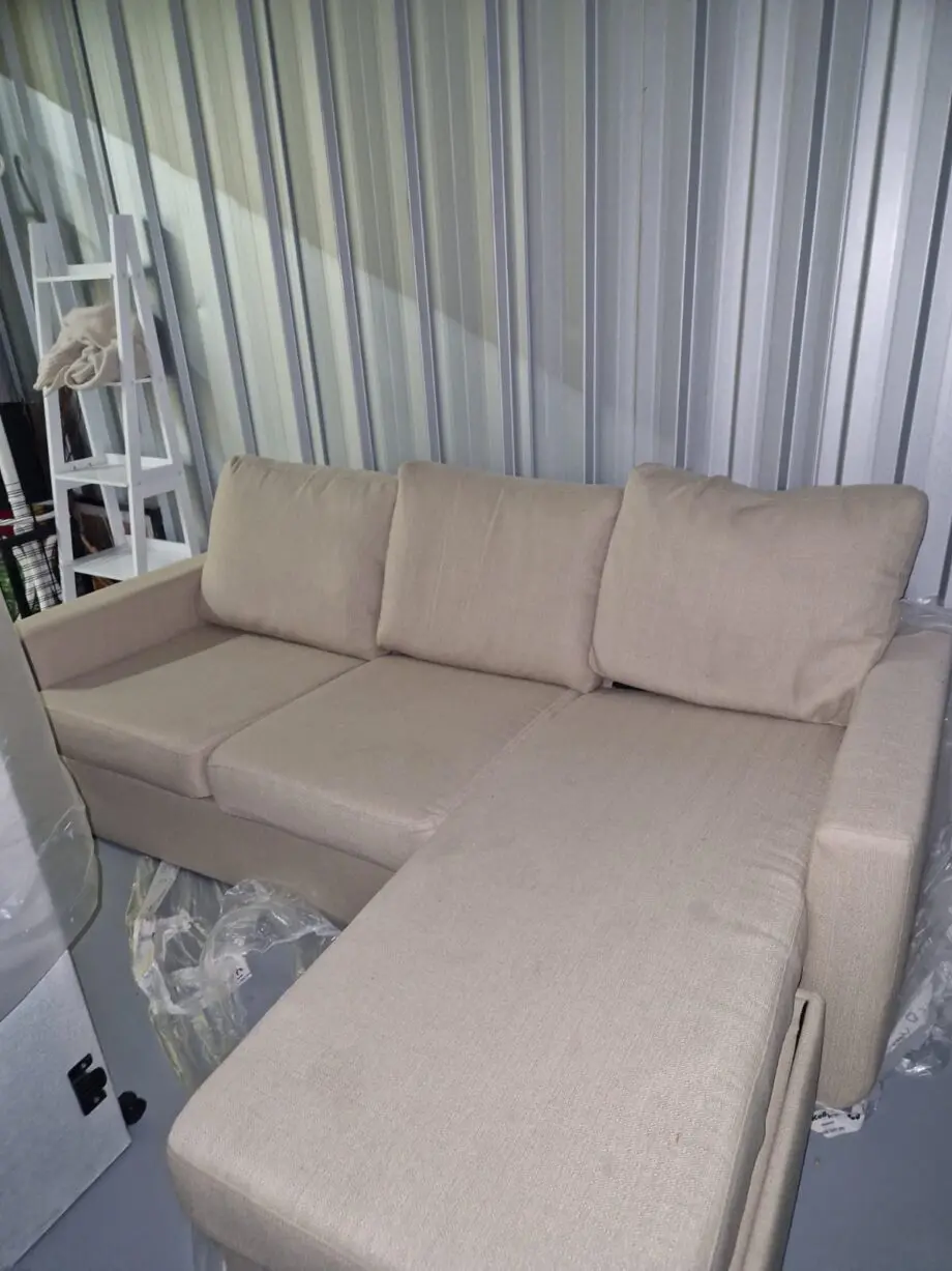 Dunelm Oat 3 seater-sofa bed with storage foot stool.