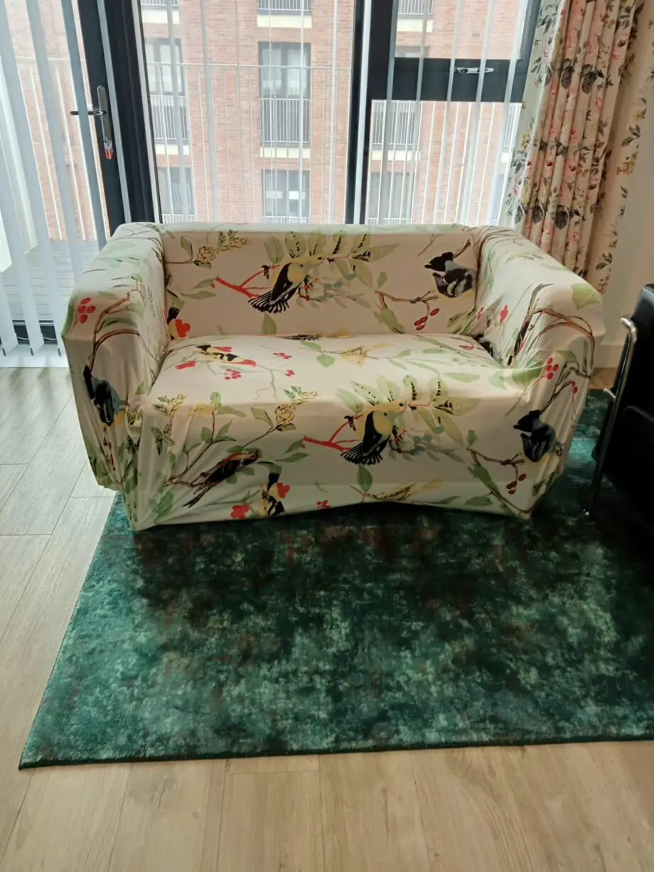 2 seater black leather sofa