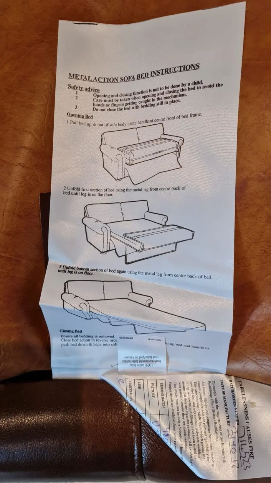 Brown leather 2 seater sofa bed
