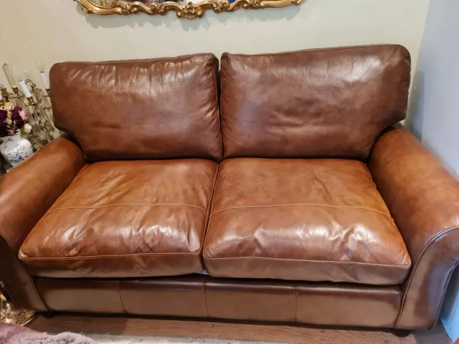 Brown leather 2 seater sofa bed