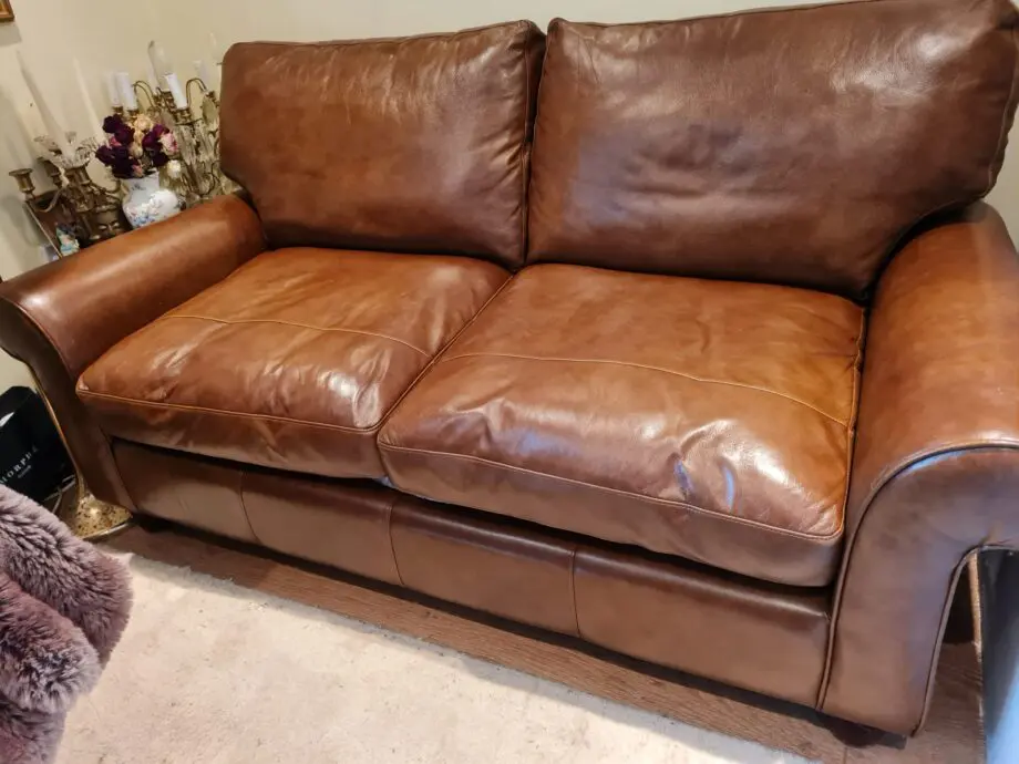Brown leather 2 seater sofa bed
