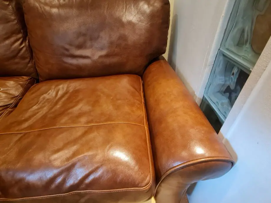 Brown leather 2 seater sofa bed