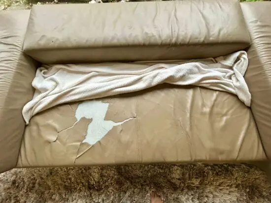 2 Seater modern reclining back sofa - Need re upholstering