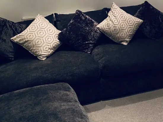 DFS sofa with pouffe and cushions