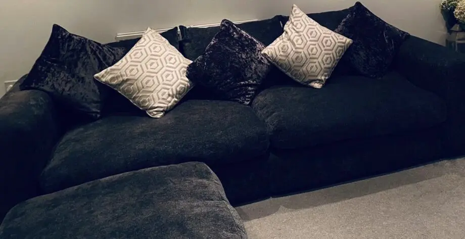 DFS sofa with pouffe and cushions