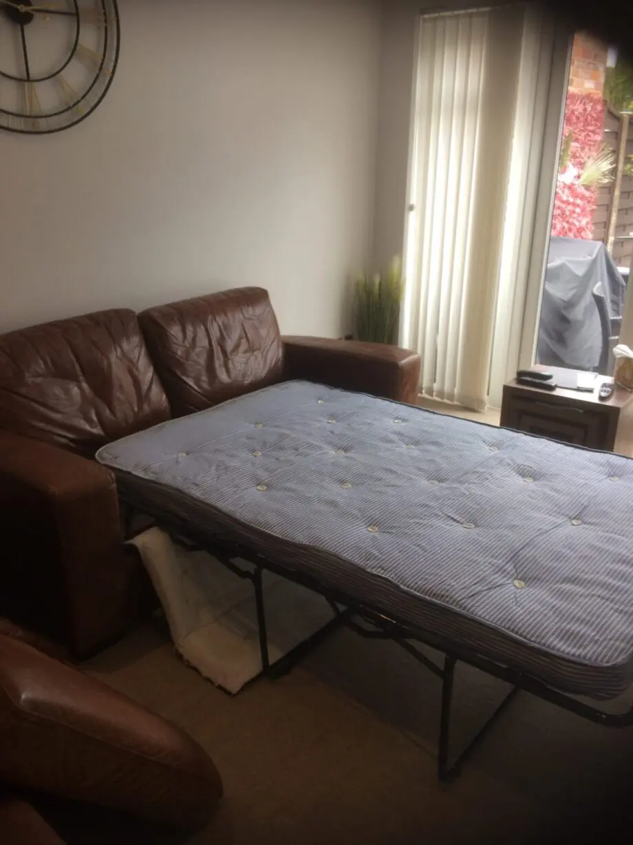 Next 3 seater sofa brown. Matching 2 seater sofa folds down to a double bed