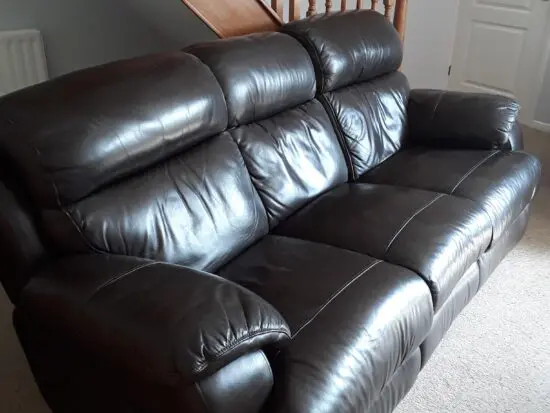 Leather chocolate brown 3 piece recling suite in near new condition.
