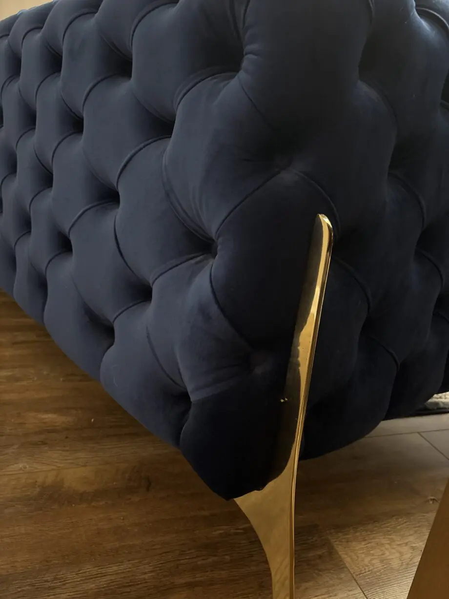 Royal blue chesterfield style sofa