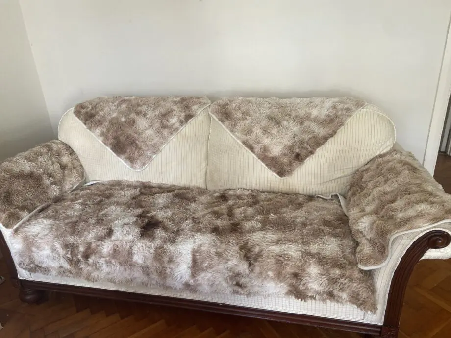 Sofa with additional top cover