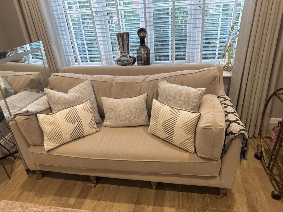 SOFT GREY VELVET UPHOLSTERED SOFAS WITH NATURAL LEG ON CASTORS