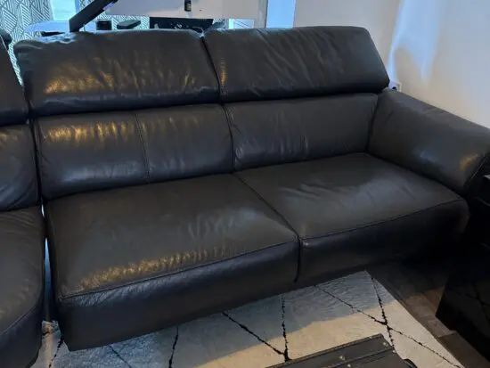 DFS black large corner sofa