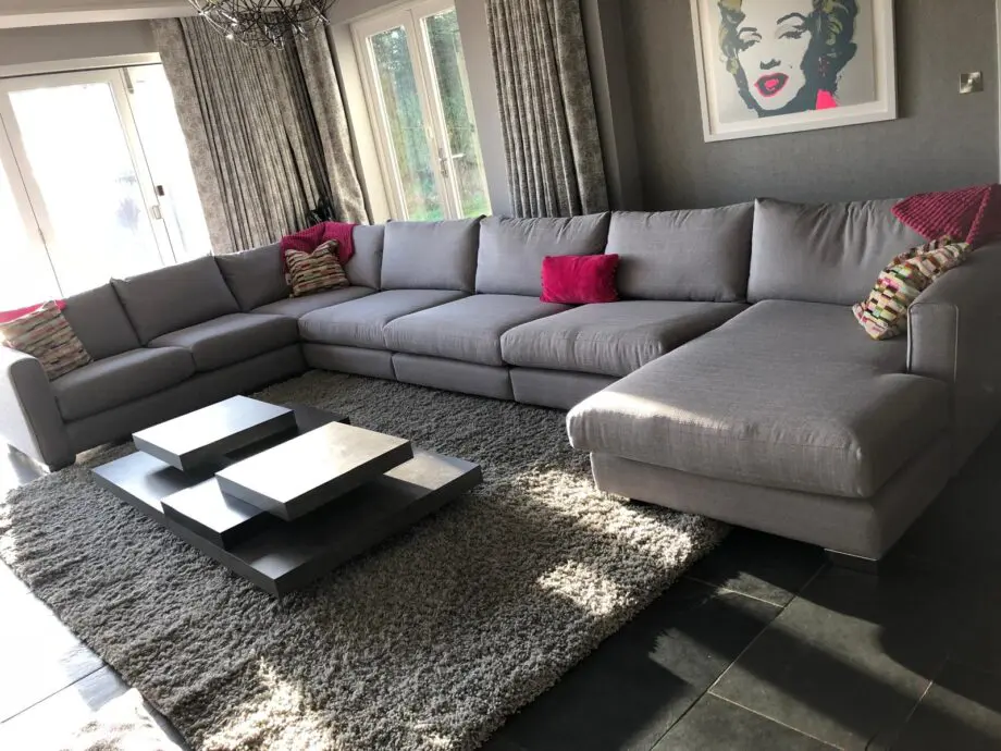 Extra large grey corner sofa with footstool and storage