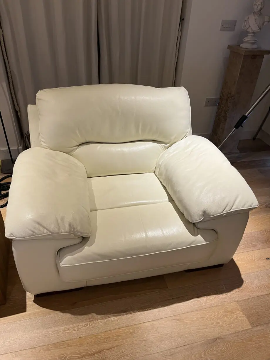 DFS 3 and 1.5 Leather Sofa and matching Chair plus footstool. In Ivory/Cream
