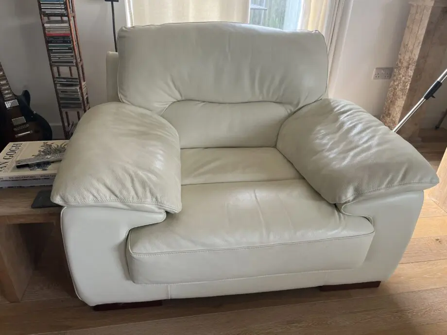 DFS 3 and 1.5 Leather Sofa and matching Chair plus footstool. In Ivory/Cream