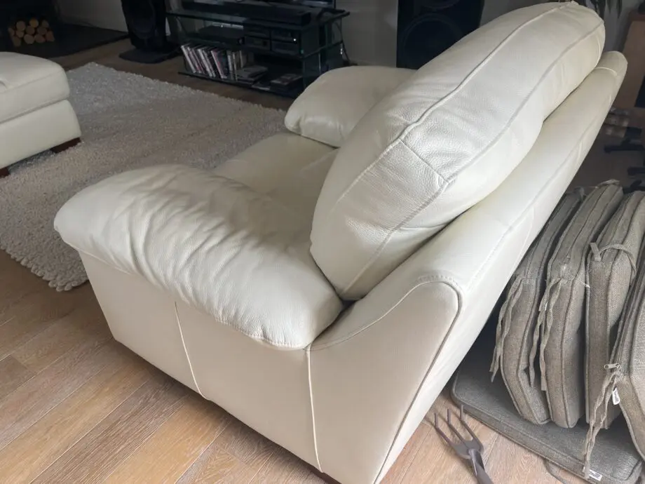DFS 3 and 1.5 Leather Sofa and matching Chair plus footstool. In Ivory/Cream